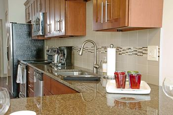Kitchen with granite counters and stainless steel sink